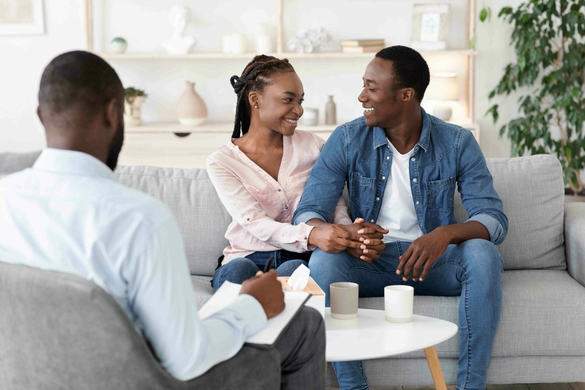 BiPoc Couple in therapy speaking with a Clinician of Color