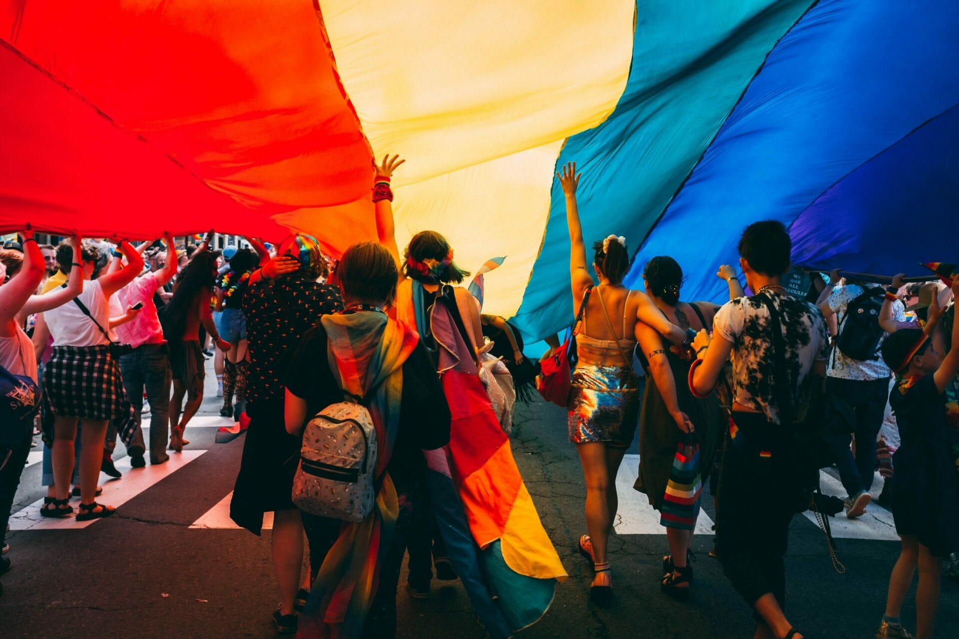 LGBTQ+ Flag parage with people